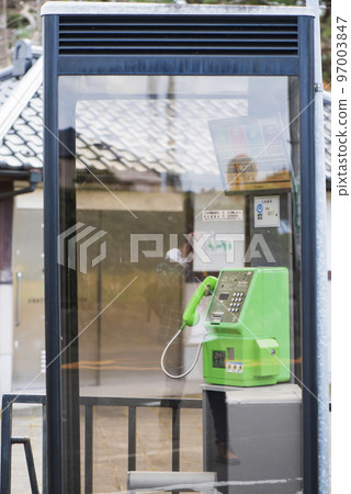 A nostalgic telephone box in the ruins of an abandoned castle A nostalgic telephone box in the ruins of an abandoned castle 97003847