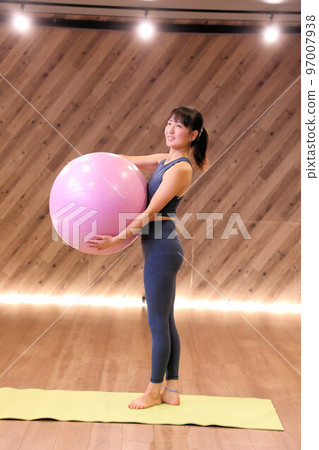Balance ball and beauty yoga instructor at yoga studio 97007938