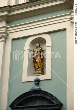 Krakow Main Square Rynek Glowny Poland. Krakow architecture, old city architecture. Historic church in Krakow Baroque architecture Travel tourist attraction Krakow Main Square Rynek Glowny Poland. Krakow architecture, old city architecture. Historic church in Krakow Baroque architecture Travel tourist attraction 97008771