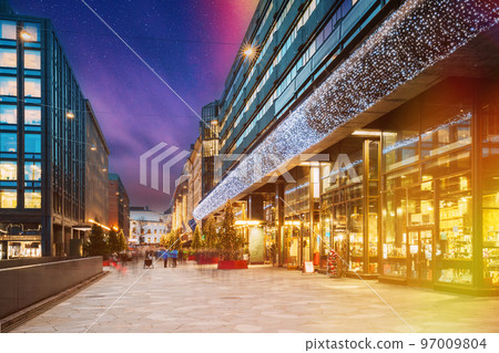 Helsinki, Finland. Very Peri Starry Sky Above Shopping Center In New Year Lights Christmas Tree Decorations And Festive Illumination In Kaivokatu Street. Winter Xmas Holiday Season. Light Purple Sky Helsinki, Finland. Very Peri Starry Sky Above Shopping Center In New Year Lights Christmas Tree Decorations And Festive Illumination In Kaivokatu Street. Winter Xmas Holiday Season. Light Purple Sky 97009804
