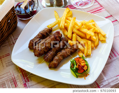 Grilled dish of minced meat Cevapcici Grilled dish of minced meat Cevapcici 97010093