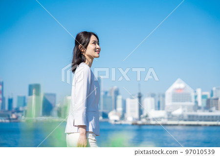 Career woman looking up to the future 97010539