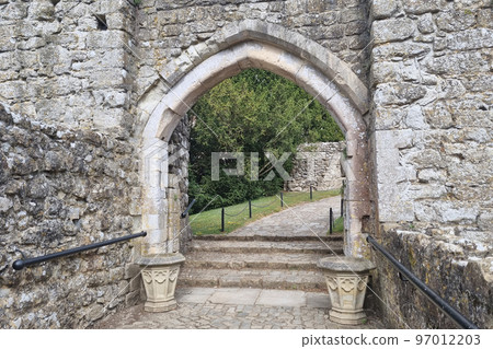 View of the wall of the old castle. Entrance to the castle. 97012203
