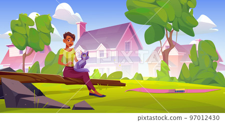Biracial woman sitting outdoors with cat on laps Biracial woman sitting outdoors with cat on laps 97012430