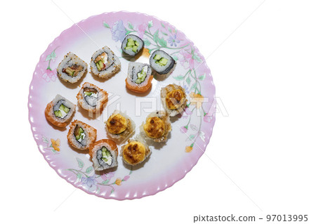 Varied set of delicious oriental sushi lounge on a porcelain ceramic pink plate 97013995