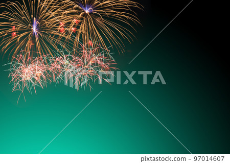 colorful fireworks display on green background 97014607
