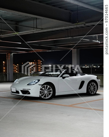 Porsche 718 Boxster in a multi-storey car park at night 97014665