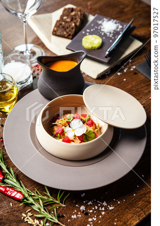 Bouillabaisse, Octopus, blue mussels, tuna, king prawns, Scottish salmon. Delicious healthy French traditional food closeup served for lunch in modern gourmet cuisine restaurant 97017527