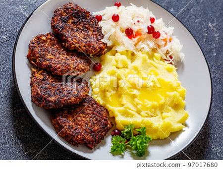 fried minced liver patties with potato mash fried minced liver patties with potato mash 97017680