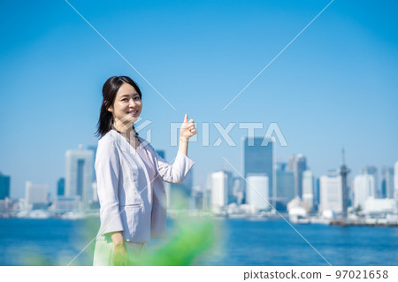 Business woman doing a good sign Business woman doing a good sign 97021658