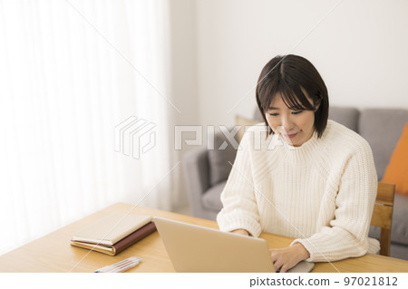 Woman working at home 97021812