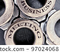 Business meeting inscription on gears 97024068