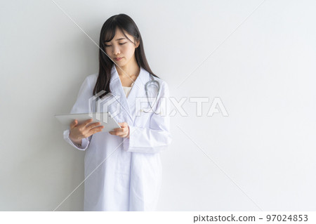 A lady in white A lady in white 97024853