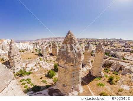 Unique geological formations in Love Valley in Cappadocia, popular travel destination in Turkey Unique geological formations in Love Valley in Cappadocia, popular travel destination in Turkey 97025498