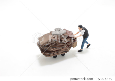 the Elderly scavenger with cardboard on trolley 97025879