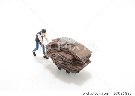 the Elderly scavenger with cardboard on trolley the Elderly scavenger with cardboard on trolley 97025883