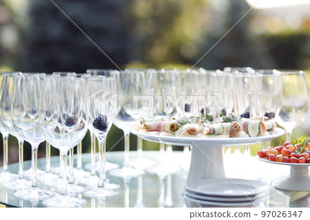 Champagne glasses on gold background. Party and holiday celebration concept Champagne glasses on gold background. Party and holiday celebration concept 97026347