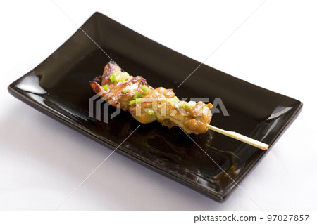 Various kind of grilling kushiyaki or meat skewers on white background. Japanese style skewered food in the izakaya restaurant. Various kind of grilling kushiyaki or meat skewers on white background. Japanese style skewered food in the izakaya restaurant. 97027857