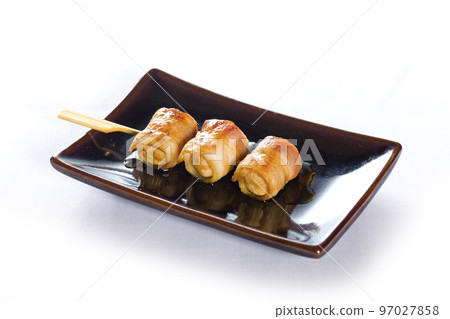 Various kind of grilling kushiyaki or meat skewers on white background. Japanese style skewered food in the izakaya restaurant. Various kind of grilling kushiyaki or meat skewers on white background. Japanese style skewered food in the izakaya restaurant. 97027858
