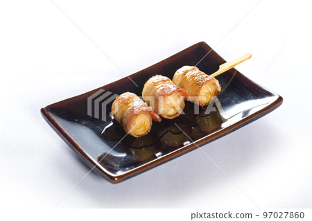 Various kind of grilling kushiyaki or meat skewers on white background. Japanese style skewered food in the izakaya restaurant. Various kind of grilling kushiyaki or meat skewers on white background. Japanese style skewered food in the izakaya restaurant. 97027860