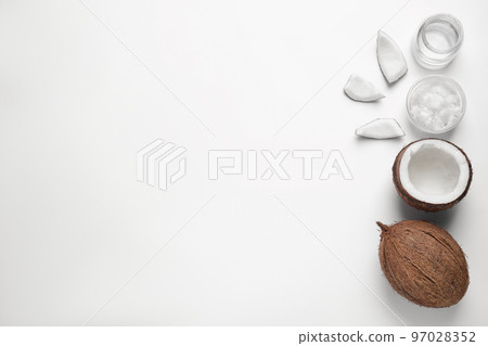 Composition with coconut oil on white background, top view Composition with coconut oil on white background, top view 97028352