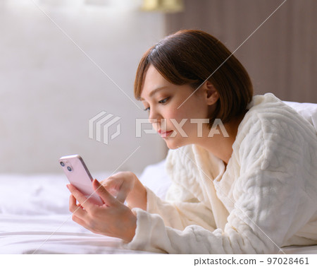 pretty woman spending time in the room 97028461