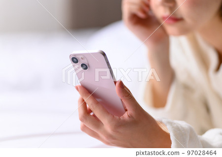 pretty woman spending time in the room pretty woman spending time in the room 97028464