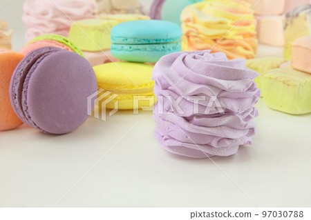 Various of sweets: macaroons, marshmallows and zephyrs. Homemade colored desserts for the present. Various of sweets: macaroons, marshmallows and zephyrs. Homemade colored desserts for the present. 97030788