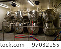 Modern interior of a brewery containing stainless steel 97032155