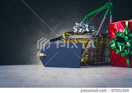 Christmas sale. Copyspace on the price tag. Buying gifts on sale. 97032369