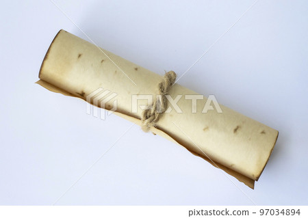 Ancient scroll. Medieval manuscript on white background Ancient scroll. Medieval manuscript on white background 97034894