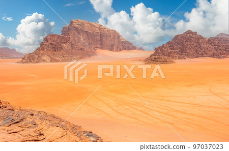 Red sands, mountains and marthian landscape panorama of Wadi Rum desert, Jordan 97037023