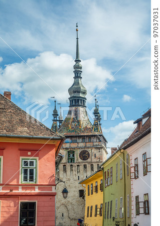 Sighisoara Clock Tower and colorful old houses, Transylvania, Romania Sighisoara Clock Tower and colorful old houses, Transylvania, Romania 97037031