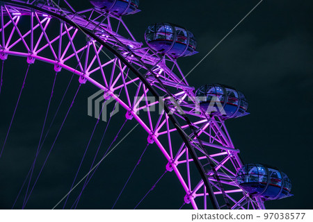 Close Up view of the London eye in London. One of the largest ferris wheels in the world. Close Up view of the London eye in London. One of the largest ferris wheels in the world. 97038577