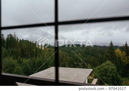 View of the mountain forest through the window 97041017
