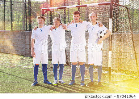Portrait Of male high school soccer team on field Portrait Of male high school soccer team on field 97041064