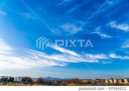 cold winter sky with lots of clouds 97044822