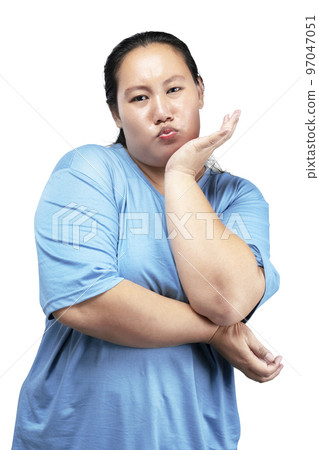 Asian fat overweight woman with a funny expression 97047051
