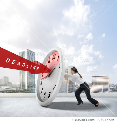 Asian businesswoman tries to hold back the deadline arrow with a clock 97047786