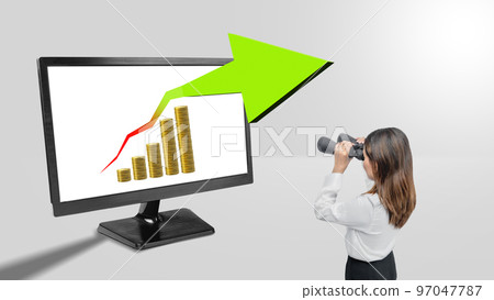 Asian businesswomen with binoculars looking at increasing graphs 97047787