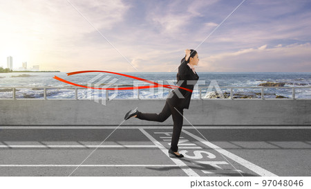 Asian businesswoman running Asian businesswoman running 97048046