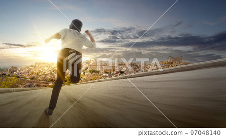 Rear view of Asian businessman running 97048140