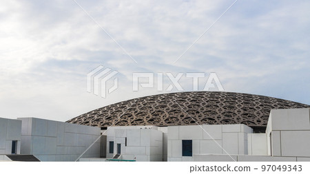 11.02.2020 Abu Dhabi United Arab Emirates Partial view of Louvre Abu Dhabi museum. United Arab Emirates. Outdoor shot during day time 97049343