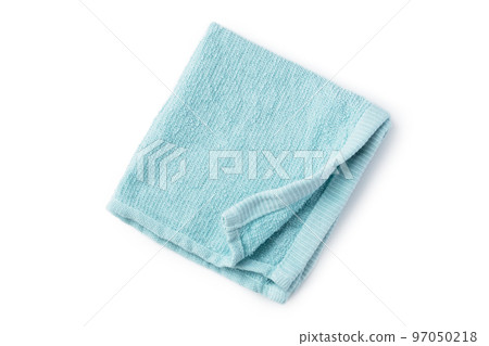 Folded blue towel isolated on white background, top view 97050218