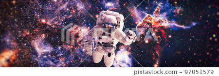 Astronaut in outer space . Astronaut wear full spacesuit for space operation . Elements of this image furnished by NASA space astronaut photos. Astronaut in outer space . Astronaut wear full spacesuit for space operation . Elements of this image furnished by NASA space astronaut photos. 97051579