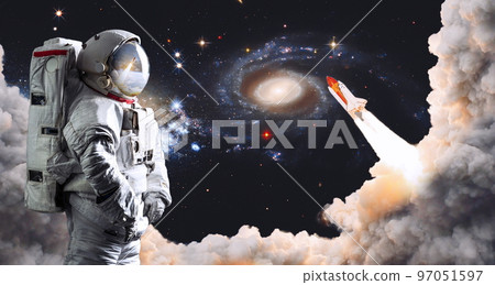 Astronaut in outer space . Astronaut wear full spacesuit for space operation . Elements of this image furnished by NASA space astronaut photos. 97051597