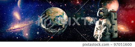 Astronaut in outer space . Astronaut wear full spacesuit for space operation . Elements of this image furnished by NASA space astronaut photos. 97051600