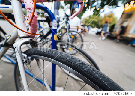 Bike Wheels close up on the street Bike Wheels close up on the street 97052600