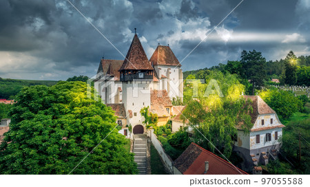 Bazna, Romania. Saxon Church in Transylvania, medieval landmark of Eastern Europe. 97055588