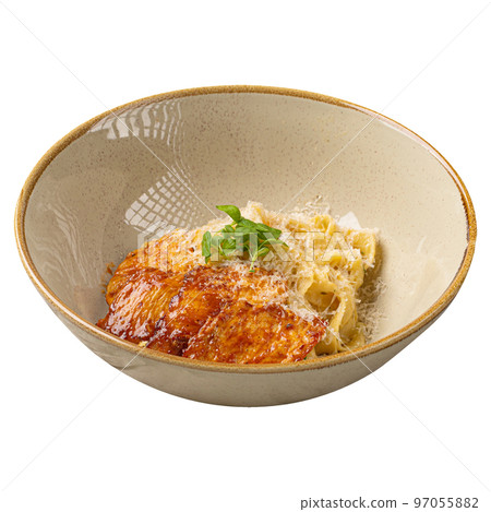 Portion of fettuccine pasta with grilled chicken Portion of fettuccine pasta with grilled chicken 97055882